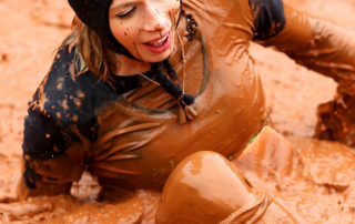 Alisha Bowers in mud pit.