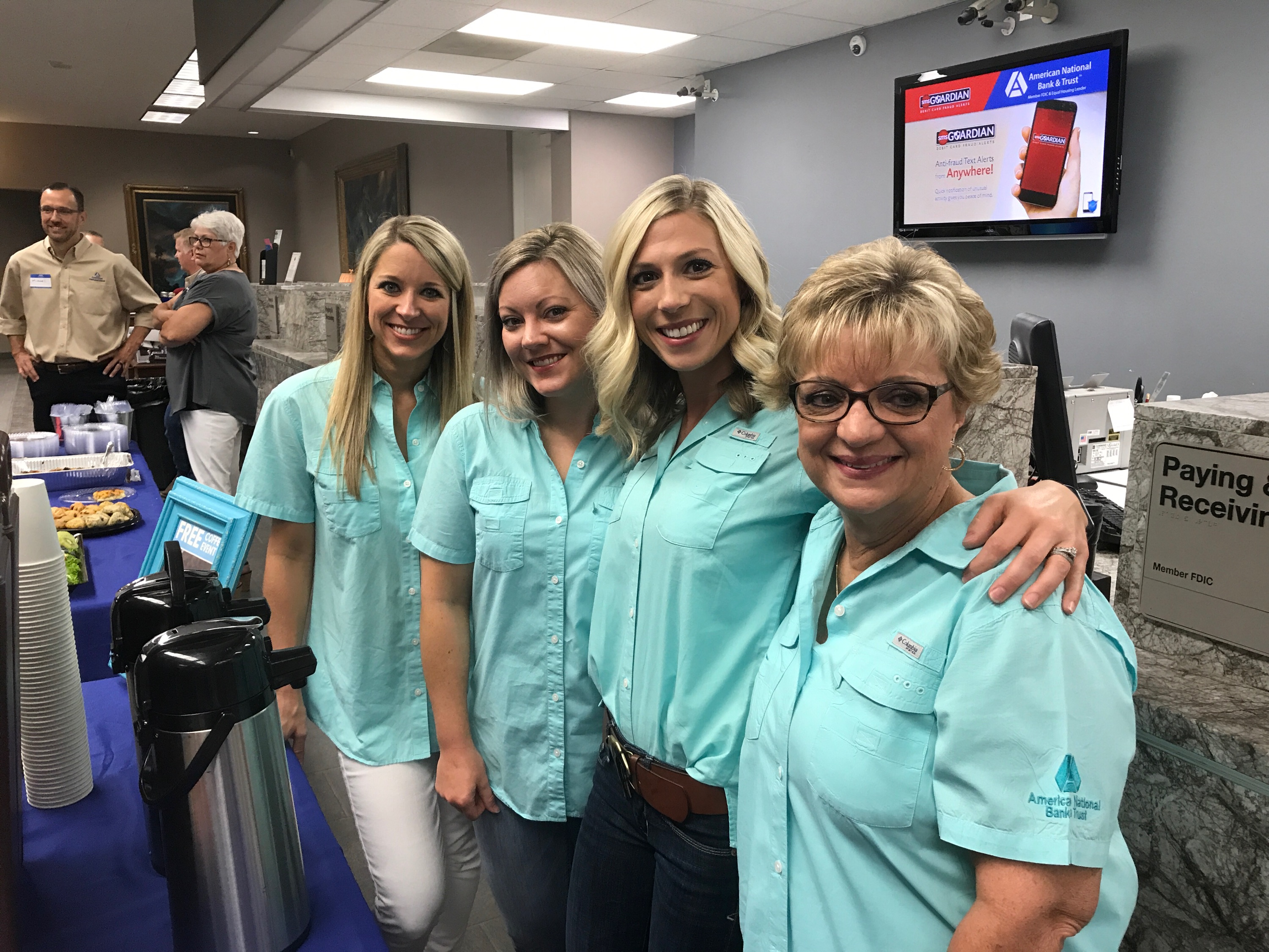 Group of employees smiling